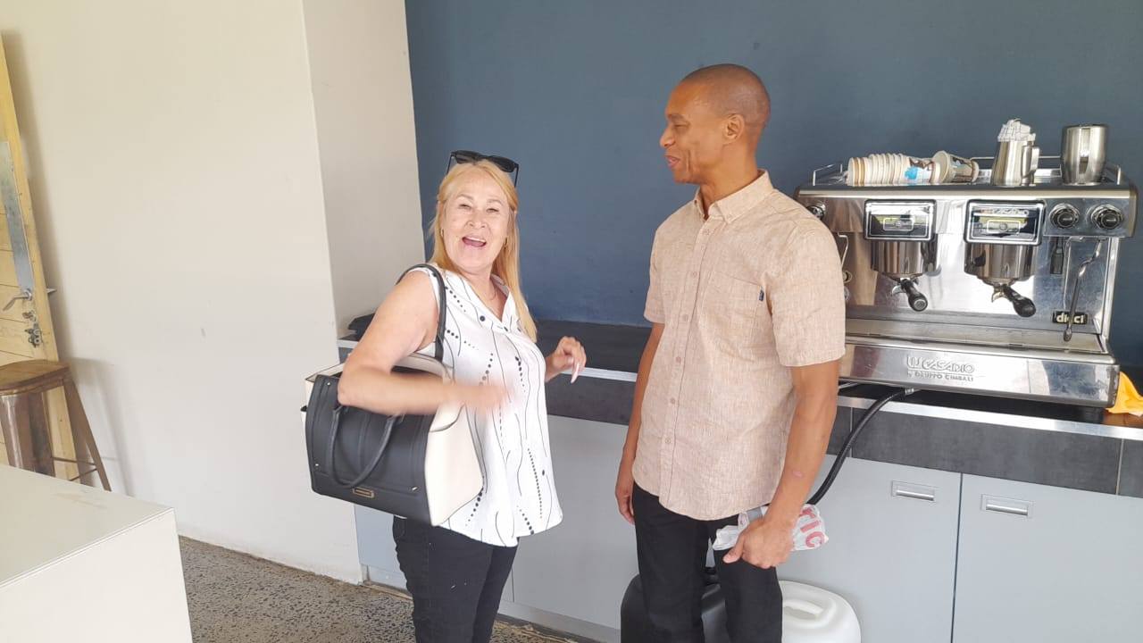 At IRIS HOUSE HOSPICE making coffee as well as motovating